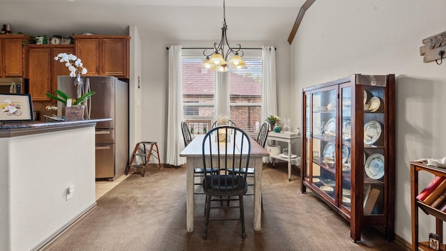 2045 Mason Pond Dr, Weatherford, TX 76085 - dining space with a chandelier and light colored carpet