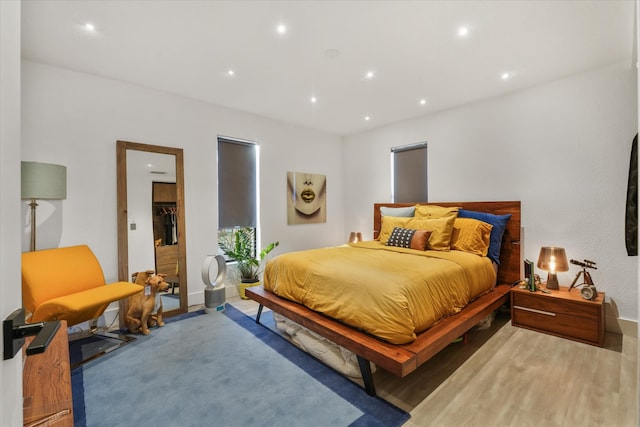 bedroom featuring wood-type flooring