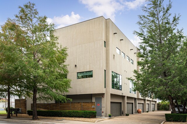 view of building exterior featuring a garage