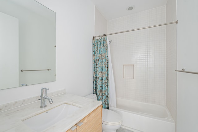 full bathroom featuring vanity, toilet, and shower / bath combo with shower curtain