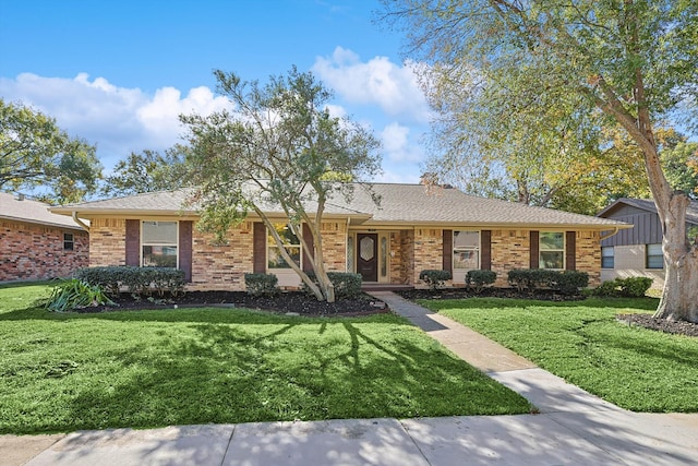 ranch-style house with a front yard