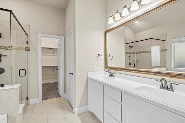 bathroom with vanity, tile patterned floors, and an enclosed shower