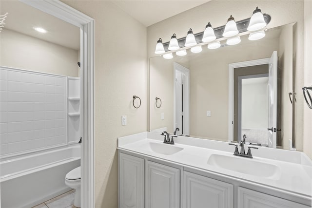 full bathroom with tile patterned flooring, vanity, toilet, and tub / shower combination