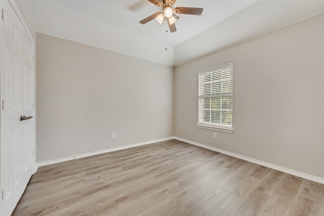 spare room with light hardwood / wood-style flooring and ceiling fan