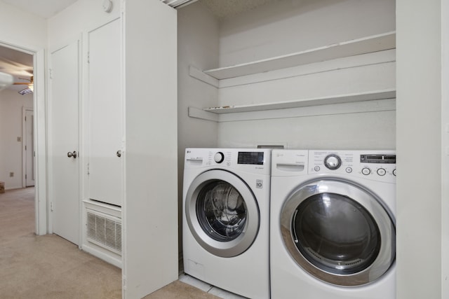 laundry room featuring independent washer and dryer