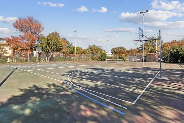 view of basketball court with tennis court