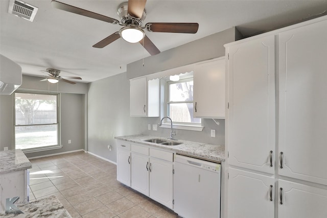 kitchen with white cabinetry, sink, white dishwasher, and light tile patterned flooring