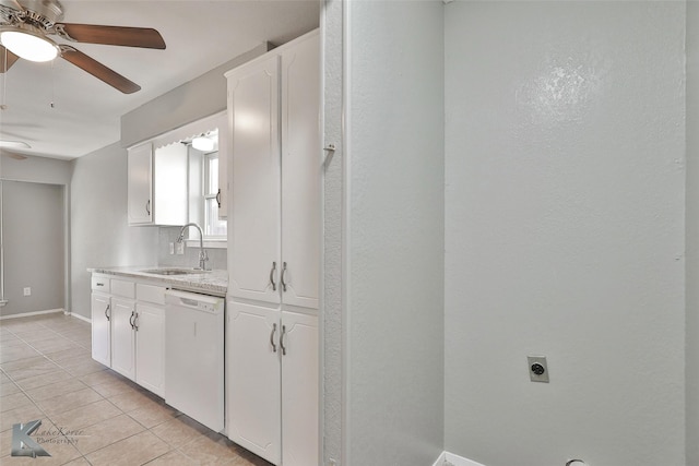 kitchen featuring white cabinets, ceiling fan, sink, dishwasher, and light tile patterned flooring