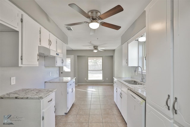 kitchen with dishwasher, white cabinets, sink, ceiling fan, and light tile patterned floors