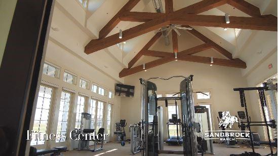 gym with high vaulted ceiling