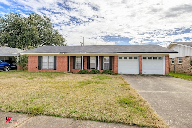 single story home featuring a garage and a front yard