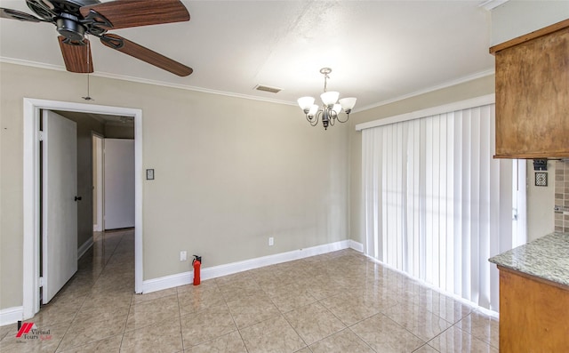 unfurnished dining area with ceiling fan with notable chandelier and crown molding