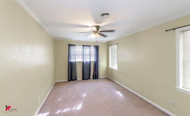 unfurnished room with ceiling fan and crown molding