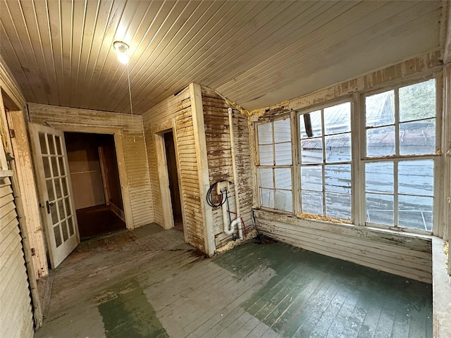 interior space featuring vaulted ceiling and wood ceiling