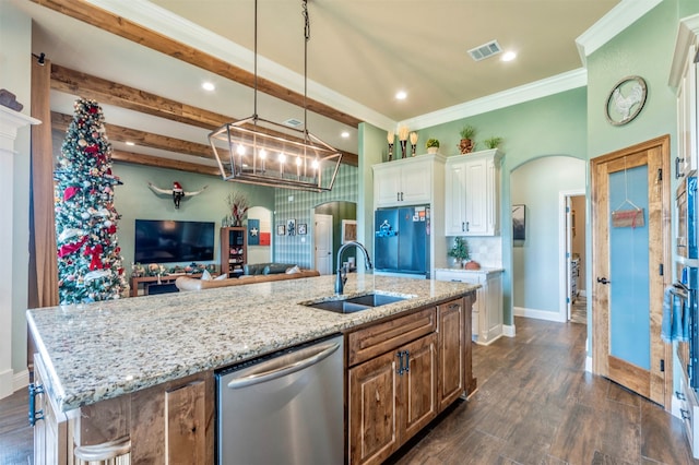 kitchen with sink, pendant lighting, dishwasher, white cabinetry, and an island with sink