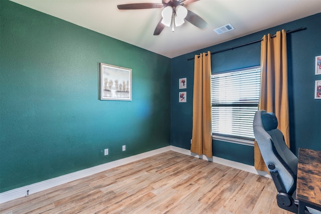 office area featuring ceiling fan and light wood-type flooring