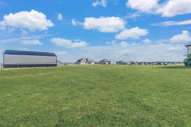 view of yard with an outdoor structure