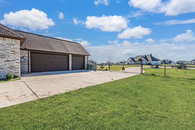 view of yard featuring a garage