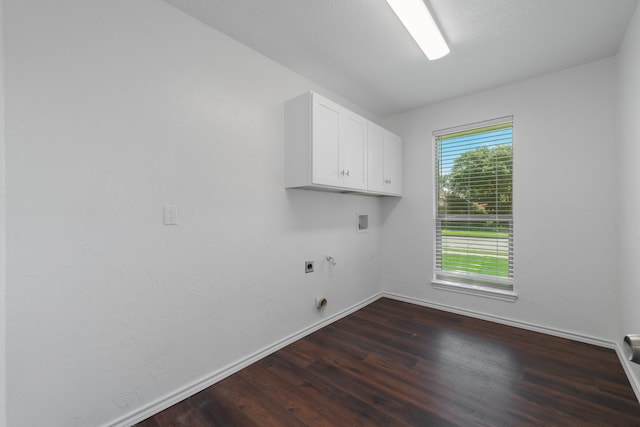 laundry room featuring cabinets, washer hookup, dark hardwood / wood-style flooring, and electric dryer hookup