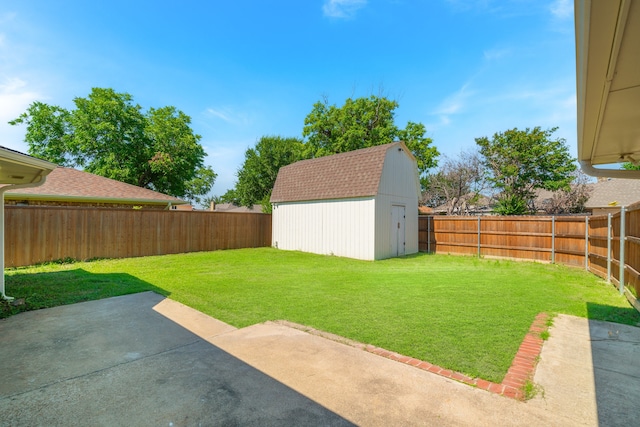 view of yard with a patio area and a shed