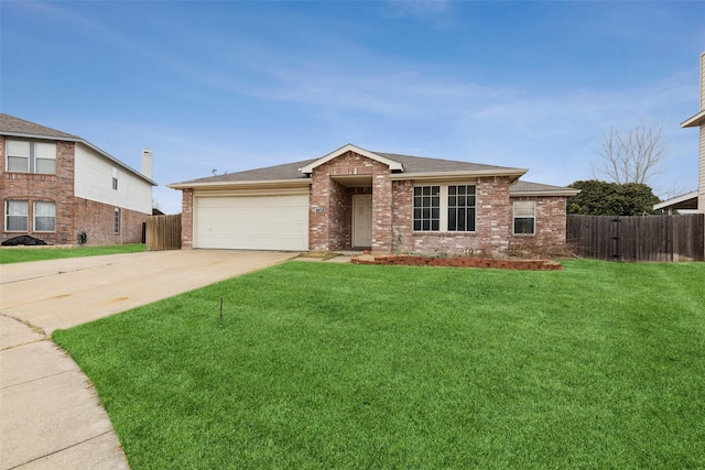 view of front of home featuring concrete driveway, brick siding, a front yard, and fence