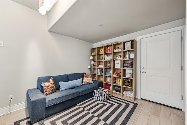 sitting room with light hardwood / wood-style floors