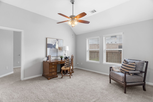 home office with ceiling fan, light colored carpet, and vaulted ceiling