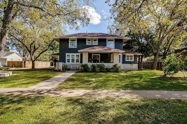 view of front of home featuring a front lawn