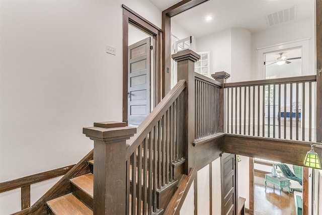 415 Featherston St, Cleburne, TX 76033 - stairs with a ceiling fan and recessed lighting