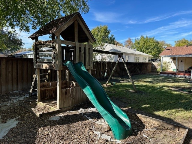 view of playground with a yard