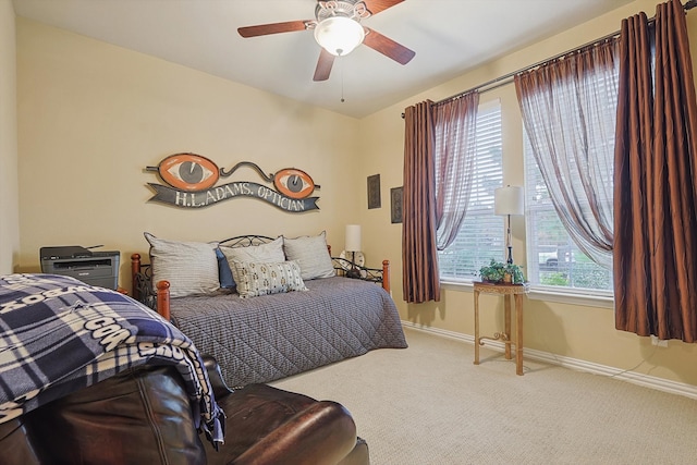 bedroom featuring ceiling fan and carpet floors