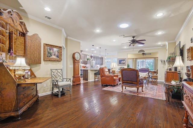 living room featuring crown molding, ceiling fan, and dark wood-type flooring