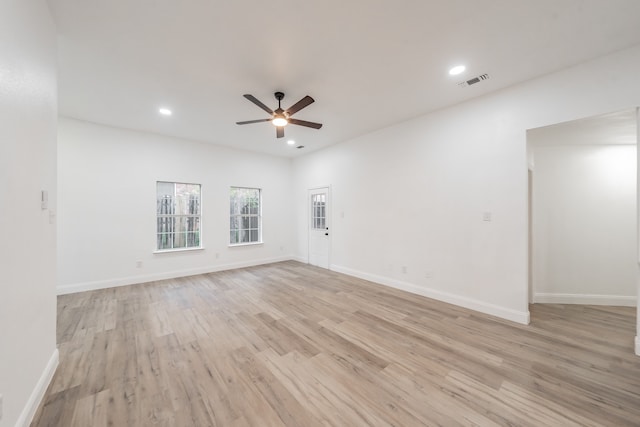 unfurnished room featuring ceiling fan and light hardwood / wood-style floors