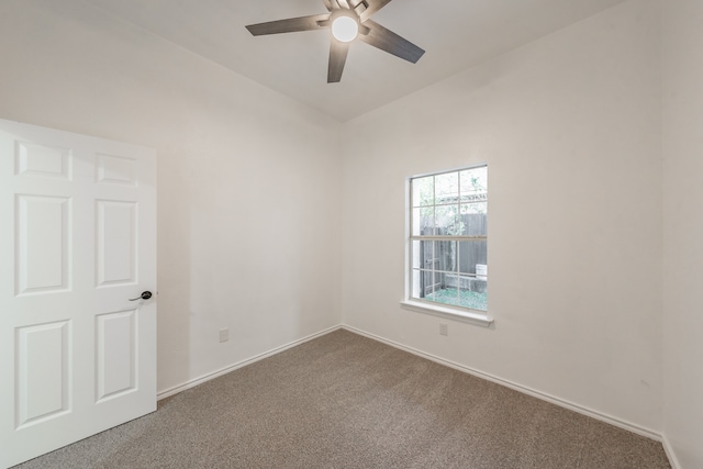 empty room with carpet flooring and ceiling fan