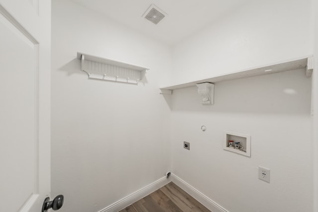 laundry room featuring electric dryer hookup, hookup for a gas dryer, washer hookup, and wood-type flooring