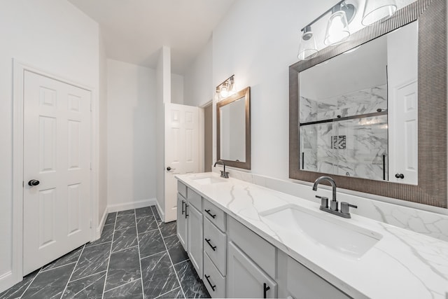 bathroom featuring vanity and a shower with shower door