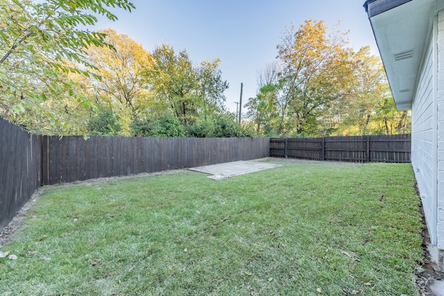 view of yard with a patio area