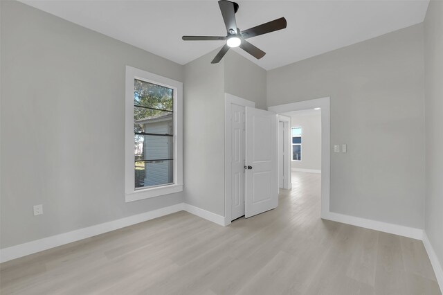 empty room featuring light hardwood / wood-style floors and ceiling fan