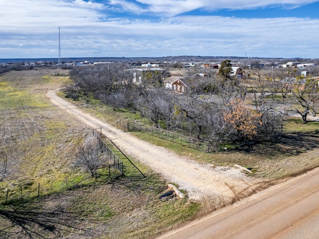 birds eye view of property featuring a rural view