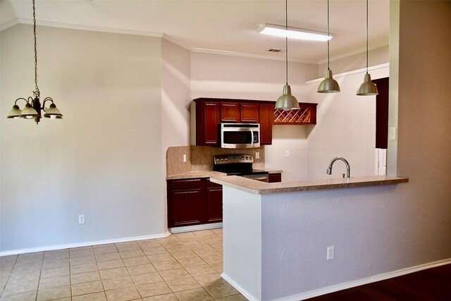 kitchen with hanging light fixtures, decorative backsplash, ornamental molding, appliances with stainless steel finishes, and a notable chandelier