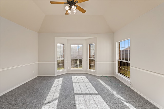 unfurnished room featuring carpet, ceiling fan, and lofted ceiling