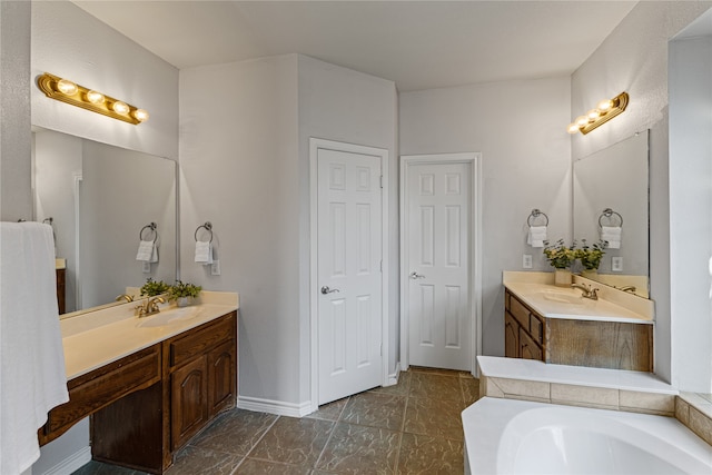 bathroom with vanity and a tub to relax in