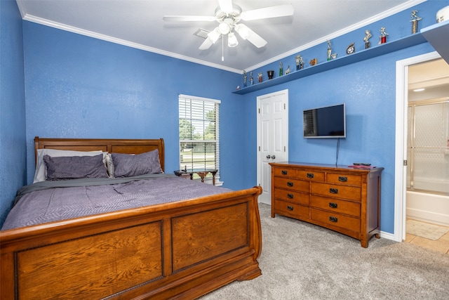 bedroom with light carpet, connected bathroom, ceiling fan, and ornamental molding