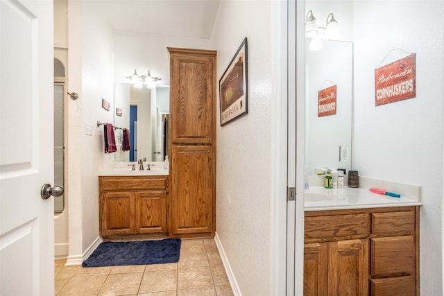 bathroom with tile patterned flooring, vanity, and shower / bathtub combination