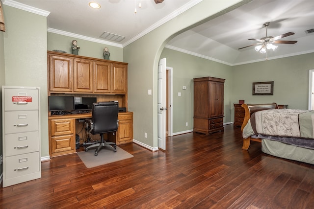 bedroom featuring crown molding, ceiling fan, and dark wood-type flooring