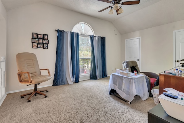 interior space with ceiling fan, a healthy amount of sunlight, and vaulted ceiling