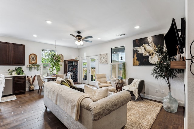 living room with french doors, dark hardwood / wood-style floors, and ceiling fan