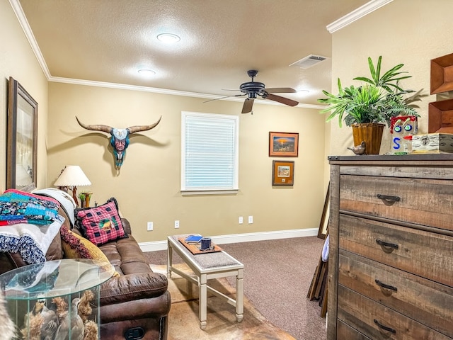 carpeted living room with a textured ceiling, ceiling fan, and crown molding