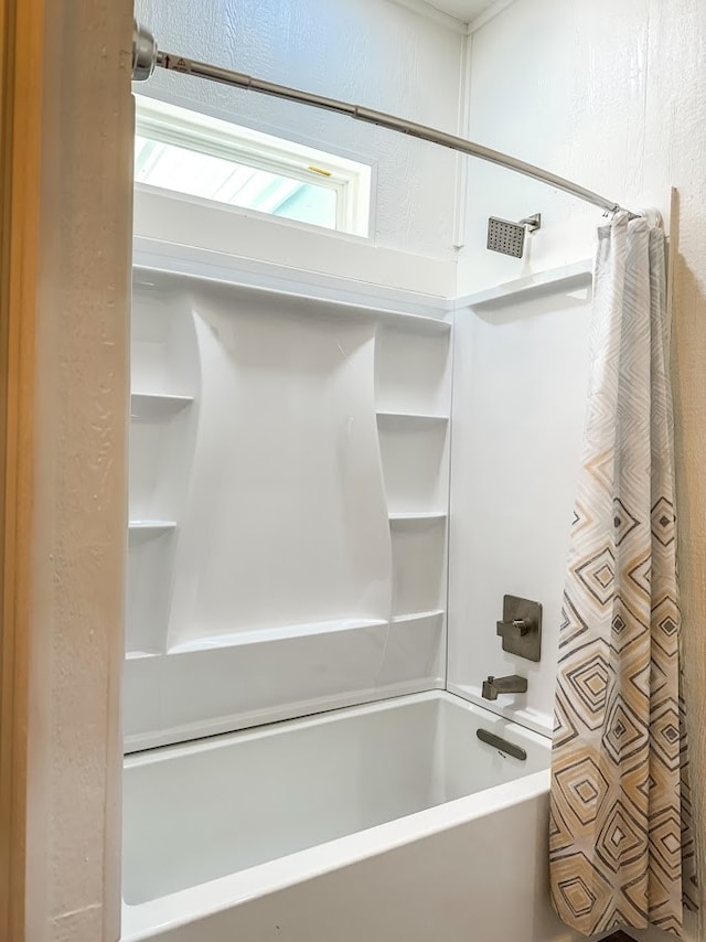 bathroom with shower / tub combo