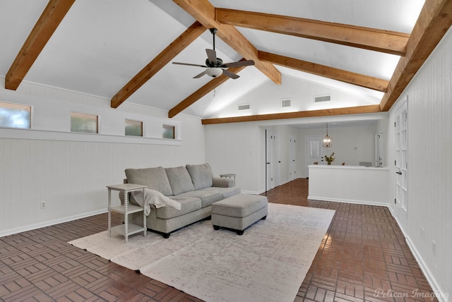 living room featuring ceiling fan and lofted ceiling with beams